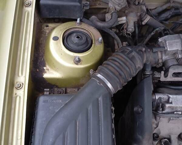 Желтый Дэу Ланос, объемом двигателя 1.39 л и пробегом 195 тыс. км за 2200 $, фото 19 на Automoto.ua