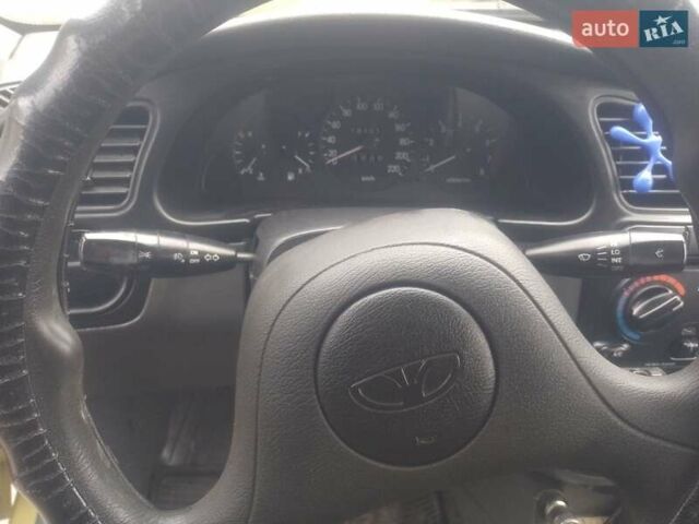 Желтый Дэу Ланос, объемом двигателя 1.5 л и пробегом 190 тыс. км за 1750 $, фото 23 на Automoto.ua