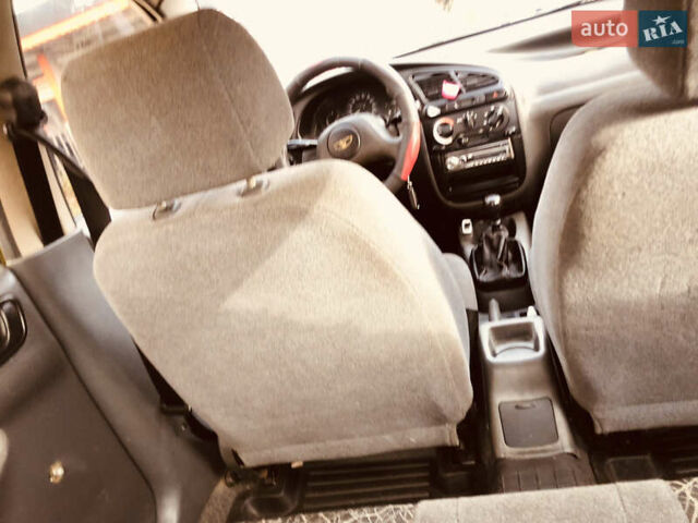 Жовтий Деу Ланос, об'ємом двигуна 1.39 л та пробігом 240 тис. км за 1700 $, фото 18 на Automoto.ua