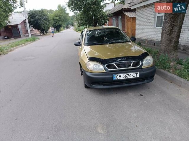 Желтый Дэу Ланос, объемом двигателя 1.5 л и пробегом 244 тыс. км за 1490 $, фото 9 на Automoto.ua