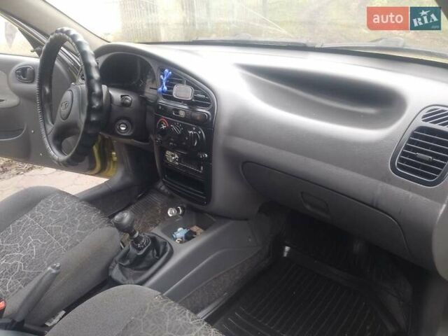 Желтый Дэу Ланос, объемом двигателя 1.5 л и пробегом 190 тыс. км за 1750 $, фото 13 на Automoto.ua