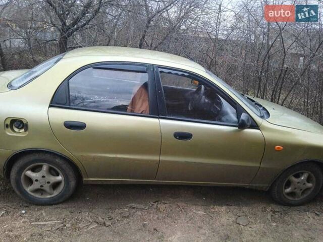 Жовтий Деу Ланос, об'ємом двигуна 1.5 л та пробігом 400 тис. км за 1800 $, фото 2 на Automoto.ua