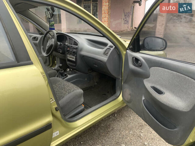 Жовтий Деу Ланос, об'ємом двигуна 1.5 л та пробігом 126 тис. км за 1899 $, фото 12 на Automoto.ua