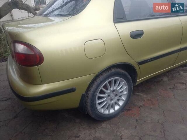 Желтый Дэу Ланос, объемом двигателя 1.5 л и пробегом 190 тыс. км за 1750 $, фото 8 на Automoto.ua