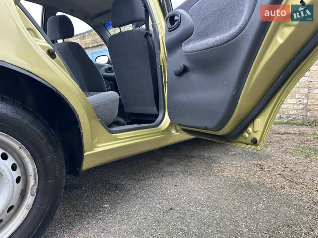 Жовтий Деу Ланос, об'ємом двигуна 1.4 л та пробігом 64 тис. км за 2550 $, фото 12 на Automoto.ua