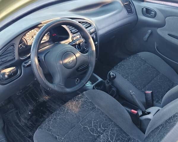 Жовтий Деу Ланос, об'ємом двигуна 1.5 л та пробігом 187 тис. км за 1100 $, фото 5 на Automoto.ua