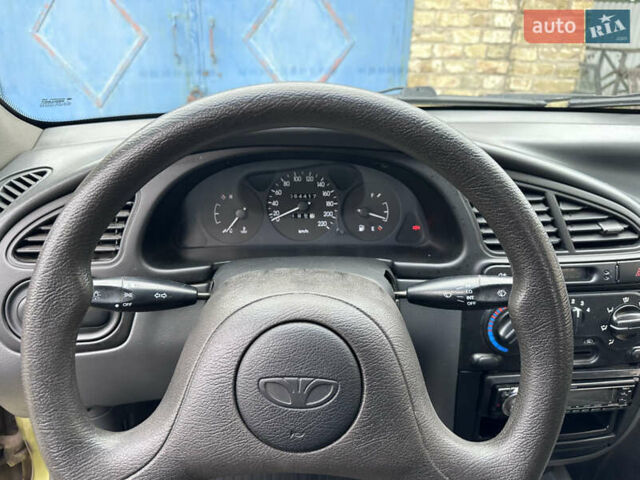 Жовтий Деу Ланос, об'ємом двигуна 1.4 л та пробігом 64 тис. км за 2550 $, фото 7 на Automoto.ua