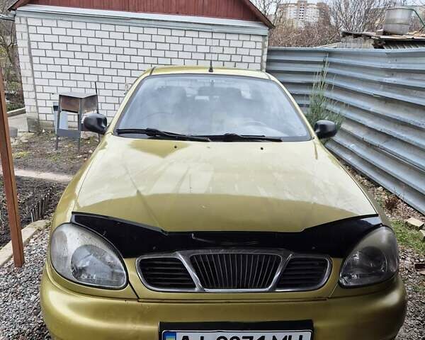 Желтый Дэу Ланос, объемом двигателя 1.5 л и пробегом 130 тыс. км за 2300 $, фото 4 на Automoto.ua