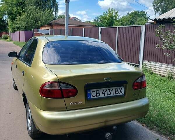 Желтый Дэу Ланос, объемом двигателя 1.39 л и пробегом 105 тыс. км за 2650 $, фото 6 на Automoto.ua