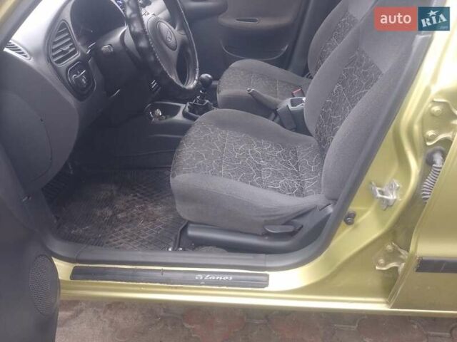 Желтый Дэу Ланос, объемом двигателя 1.5 л и пробегом 190 тыс. км за 1750 $, фото 21 на Automoto.ua