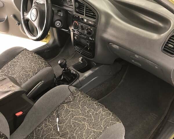 Жовтий Деу Ланос, об'ємом двигуна 1.4 л та пробігом 120 тис. км за 2999 $, фото 11 на Automoto.ua