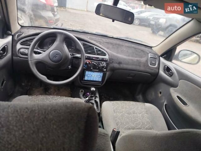 Желтый Дэу Ланос, объемом двигателя 1.5 л и пробегом 200 тыс. км за 1300 $, фото 9 на Automoto.ua