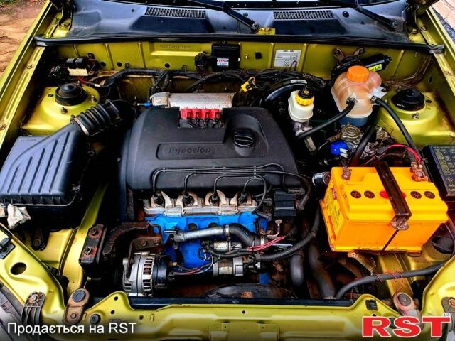 Жовтий Деу Ланос, об'ємом двигуна 1.4 л та пробігом 119 тис. км за 2450 $, фото 8 на Automoto.ua