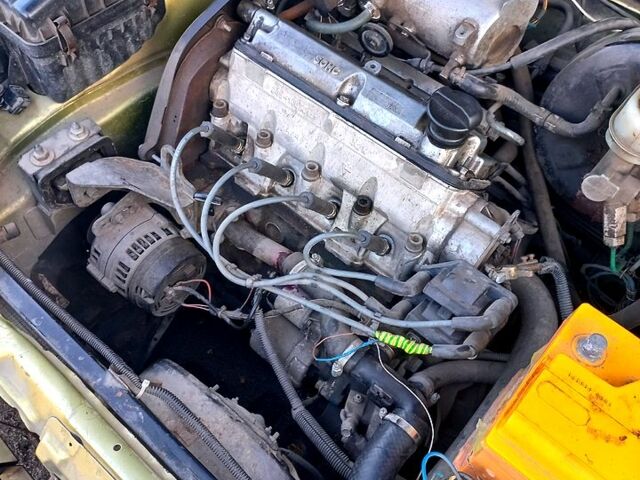 Желтый Дэу Ланос, объемом двигателя 1.4 л и пробегом 190 тыс. км за 900 $, фото 5 на Automoto.ua