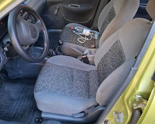 Желтый Дэу Ланос, объемом двигателя 1.5 л и пробегом 215 тыс. км за 1600 $, фото 15 на Automoto.ua