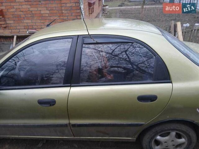 Жовтий Деу Ланос, об'ємом двигуна 1.5 л та пробігом 400 тис. км за 1800 $, фото 3 на Automoto.ua