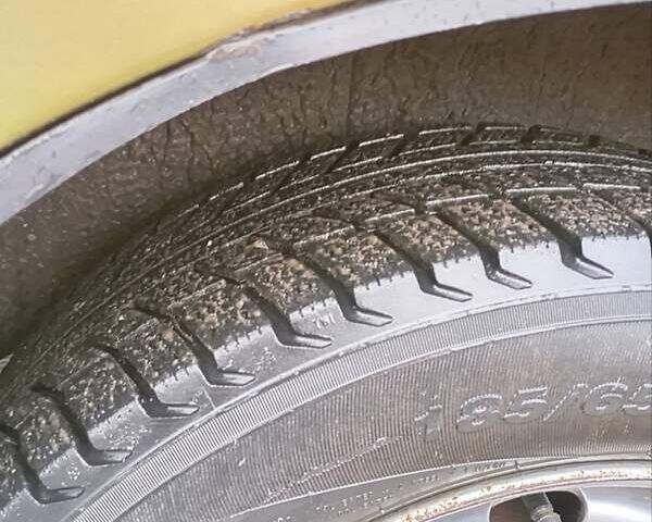 Желтый Дэу Ланос, объемом двигателя 1.39 л и пробегом 195 тыс. км за 2200 $, фото 21 на Automoto.ua