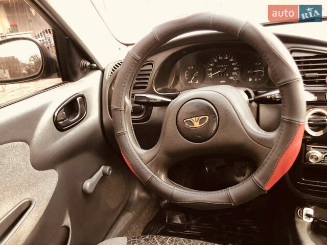 Жовтий Деу Ланос, об'ємом двигуна 1.39 л та пробігом 240 тис. км за 1700 $, фото 16 на Automoto.ua