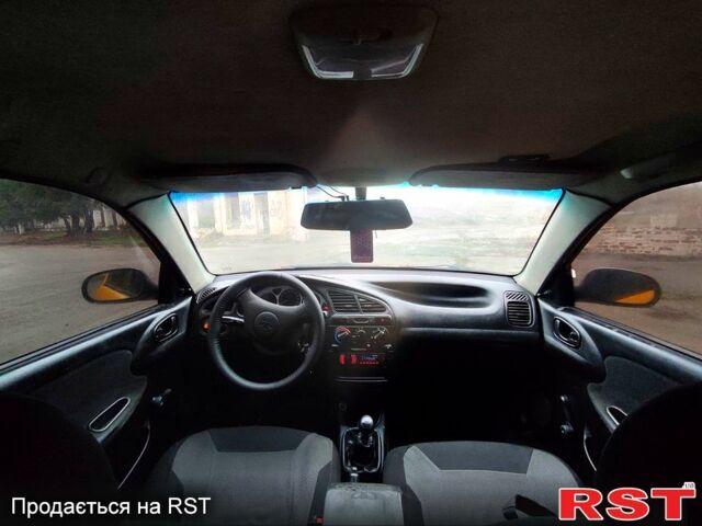 Желтый Дэу Ланос, объемом двигателя 1.4 л и пробегом 269 тыс. км за 1250 $, фото 5 на Automoto.ua