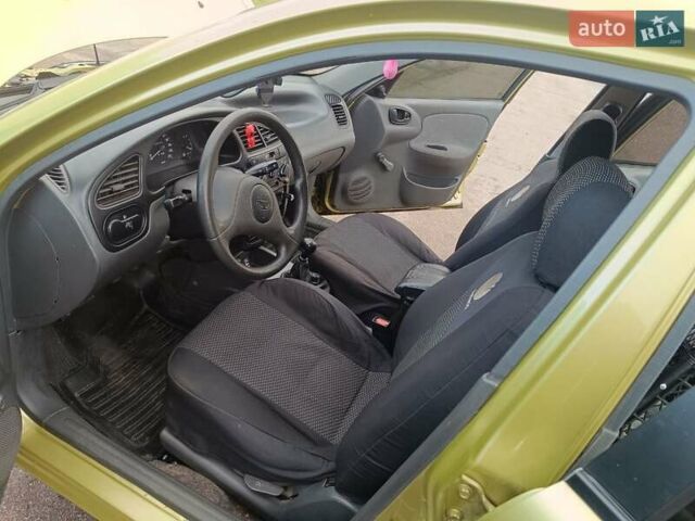 Жовтий Деу Ланос, об'ємом двигуна 1.5 л та пробігом 100 тис. км за 2500 $, фото 5 на Automoto.ua