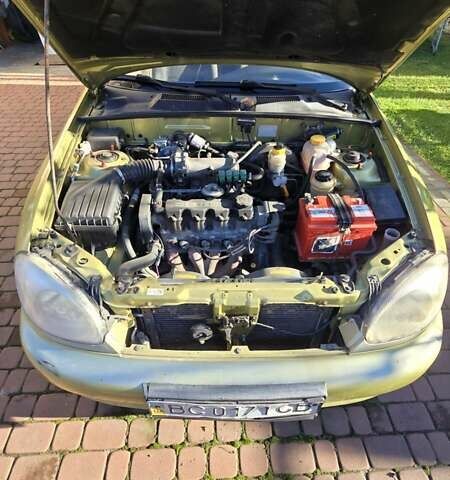 Желтый Дэу Ланос, объемом двигателя 1.5 л и пробегом 310 тыс. км за 1500 $, фото 10 на Automoto.ua