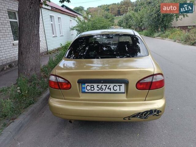 Желтый Дэу Ланос, объемом двигателя 1.5 л и пробегом 244 тыс. км за 1490 $, фото 8 на Automoto.ua