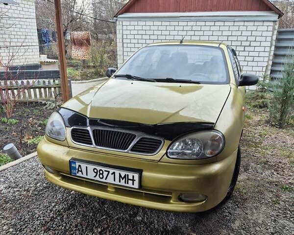 Желтый Дэу Ланос, объемом двигателя 1.5 л и пробегом 130 тыс. км за 2300 $, фото 6 на Automoto.ua