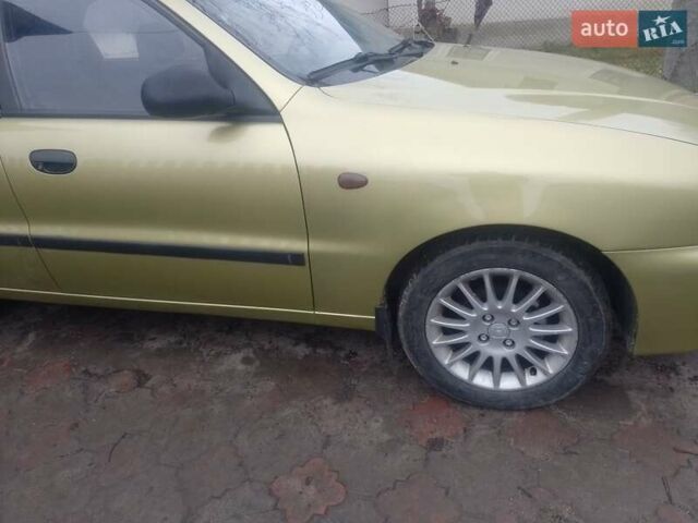 Желтый Дэу Ланос, объемом двигателя 1.5 л и пробегом 190 тыс. км за 1750 $, фото 6 на Automoto.ua