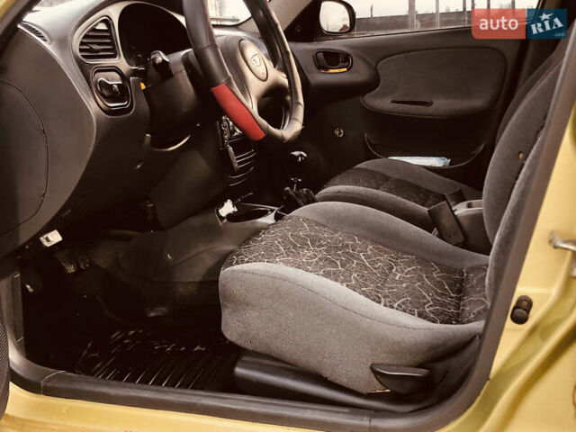 Жовтий Деу Ланос, об'ємом двигуна 1.39 л та пробігом 240 тис. км за 1700 $, фото 21 на Automoto.ua