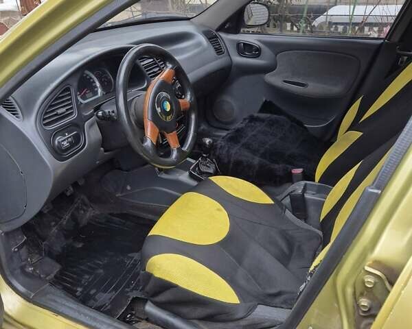 Желтый Дэу Ланос, объемом двигателя 1.5 л и пробегом 130 тыс. км за 2300 $, фото 9 на Automoto.ua