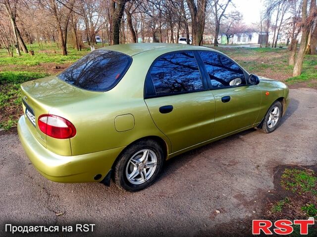 Желтый Дэу Ланос, объемом двигателя 1.4 л и пробегом 117 тыс. км за 2550 $, фото 6 на Automoto.ua