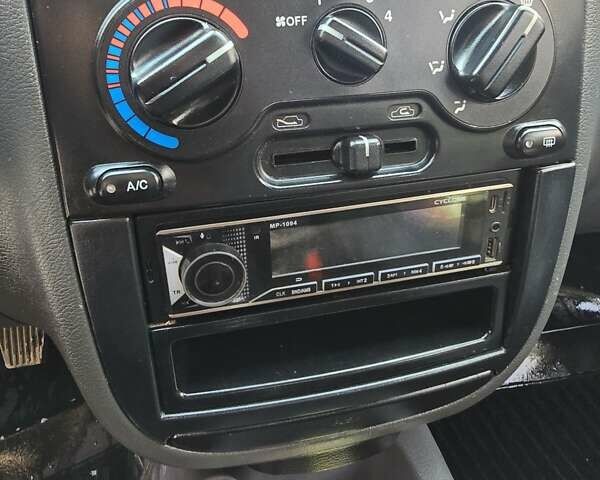 Желтый Дэу Ланос, объемом двигателя 1.5 л и пробегом 205 тыс. км за 1600 $, фото 11 на Automoto.ua