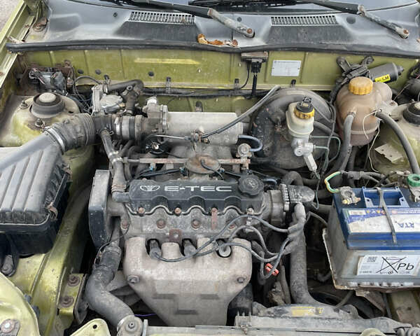 Желтый Дэу Ланос, объемом двигателя 1.5 л и пробегом 235 тыс. км за 1800 $, фото 12 на Automoto.ua