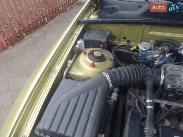 Желтый Дэу Ланос, объемом двигателя 1.5 л и пробегом 190 тыс. км за 1750 $, фото 28 на Automoto.ua
