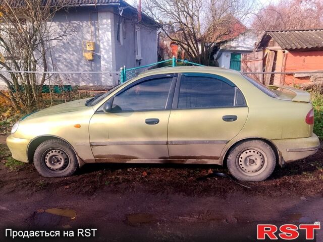 Желтый Дэу Ланос, объемом двигателя 1.4 л и пробегом 300 тыс. км за 1300 $, фото 3 на Automoto.ua