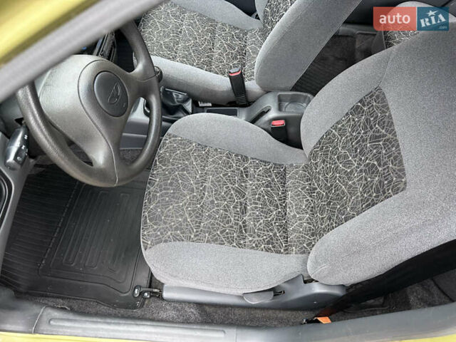 Жовтий Деу Ланос, об'ємом двигуна 1.4 л та пробігом 64 тис. км за 2550 $, фото 5 на Automoto.ua