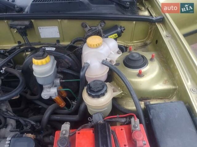 Желтый Дэу Ланос, объемом двигателя 1.5 л и пробегом 190 тыс. км за 1750 $, фото 29 на Automoto.ua