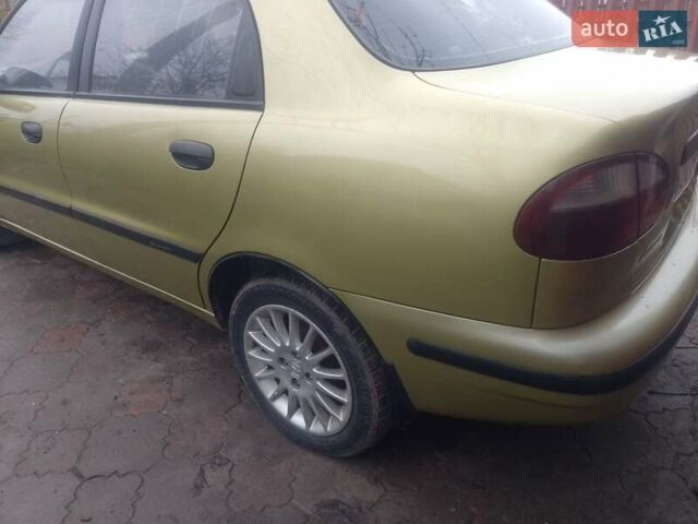 Желтый Дэу Ланос, объемом двигателя 1.5 л и пробегом 190 тыс. км за 1750 $, фото 3 на Automoto.ua