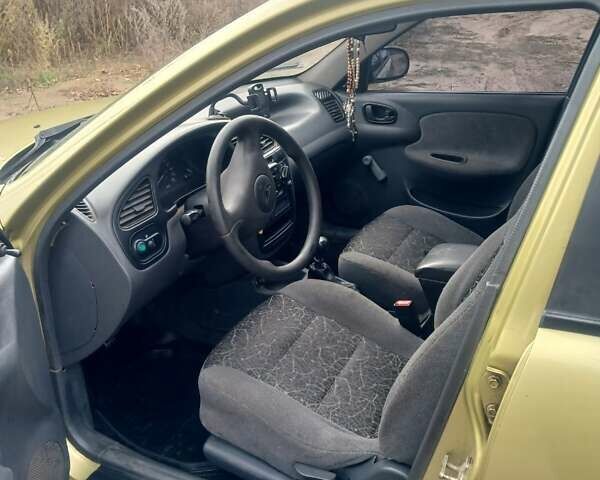 Жовтий Деу Ланос, об'ємом двигуна 1.5 л та пробігом 200 тис. км за 1100 $, фото 13 на Automoto.ua