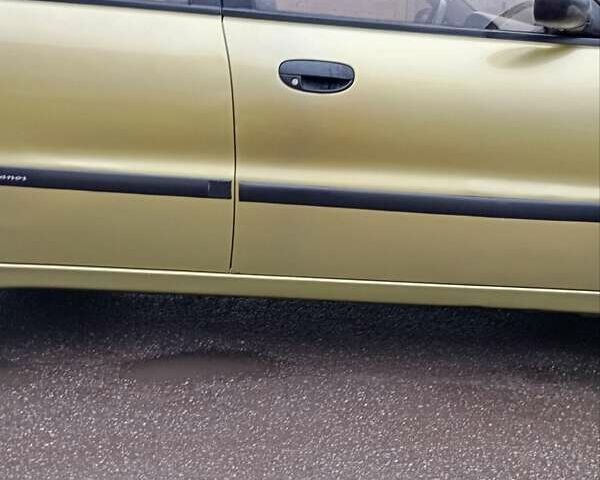 Желтый Дэу Ланос, объемом двигателя 1.39 л и пробегом 195 тыс. км за 2200 $, фото 7 на Automoto.ua