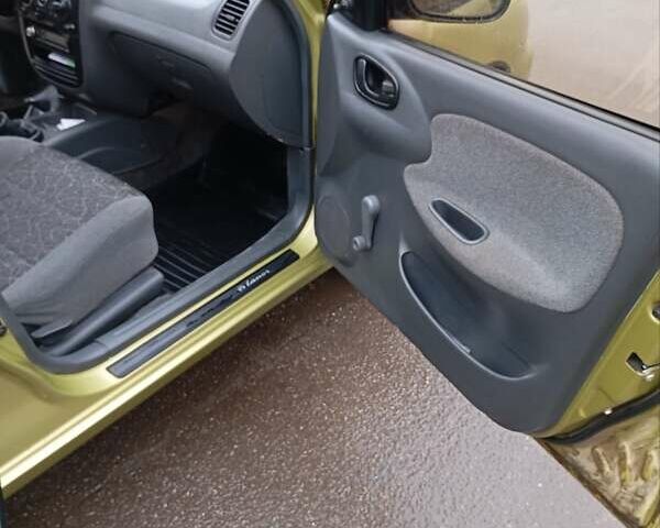 Желтый Дэу Ланос, объемом двигателя 1.39 л и пробегом 195 тыс. км за 2200 $, фото 12 на Automoto.ua