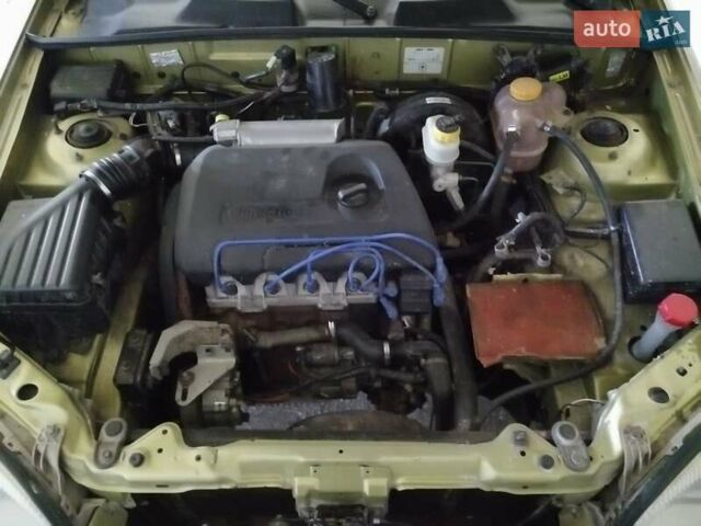 Желтый Дэу Ланос, объемом двигателя 1.39 л и пробегом 126 тыс. км за 1800 $, фото 9 на Automoto.ua