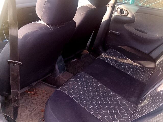 Желтый Дэу Ланос, объемом двигателя 1.4 л и пробегом 300 тыс. км за 1300 $, фото 4 на Automoto.ua