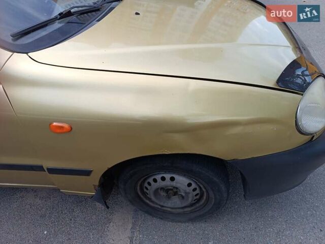 Желтый Дэу Ланос, объемом двигателя 1.5 л и пробегом 244 тыс. км за 1490 $, фото 1 на Automoto.ua