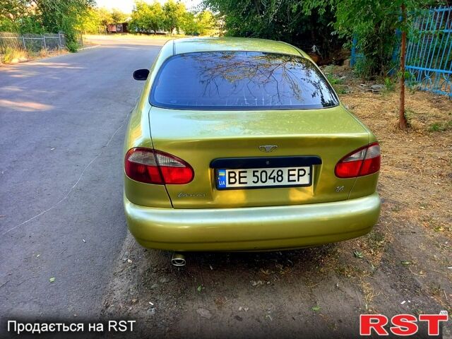 Жовтий Деу Ланос, об'ємом двигуна 1.4 л та пробігом 119 тис. км за 2450 $, фото 2 на Automoto.ua
