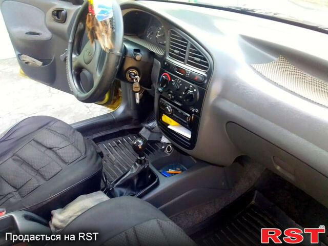 Жовтий Деу Ланос, об'ємом двигуна 1.5 л та пробігом 170 тис. км за 2800 $, фото 3 на Automoto.ua