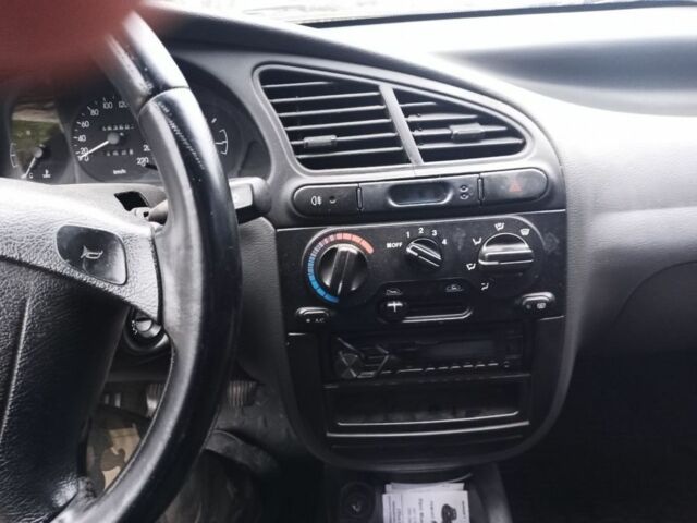 Жовтий Деу Ланос, об'ємом двигуна 1.5 л та пробігом 3 тис. км за 1700 $, фото 5 на Automoto.ua