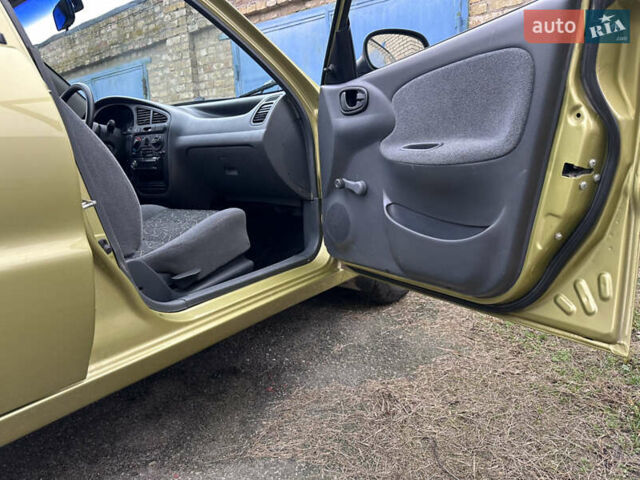 Жовтий Деу Ланос, об'ємом двигуна 1.4 л та пробігом 64 тис. км за 2550 $, фото 11 на Automoto.ua