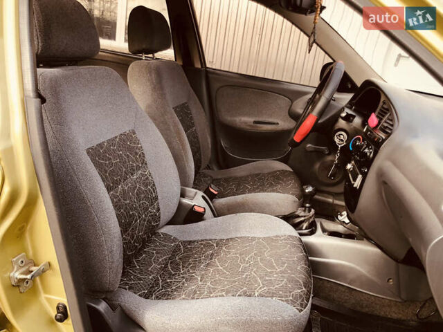 Жовтий Деу Ланос, об'ємом двигуна 1.39 л та пробігом 240 тис. км за 1700 $, фото 15 на Automoto.ua