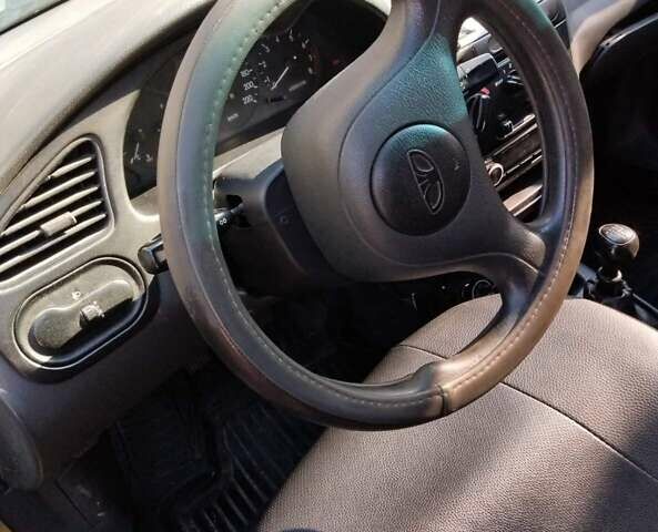 Желтый Дэу Ланос, объемом двигателя 1.5 л и пробегом 202 тыс. км за 1500 $, фото 8 на Automoto.ua